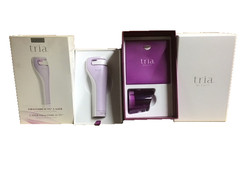 Tria Age Defying Laser / Original Box, Charging Cradle Disk, Manuals, Tested