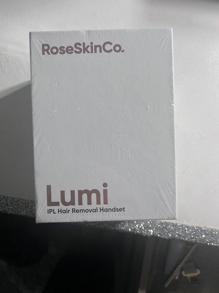 New In Box – Never Opened! Rose Skin Co. Lumi IPL Hair Removal Handset